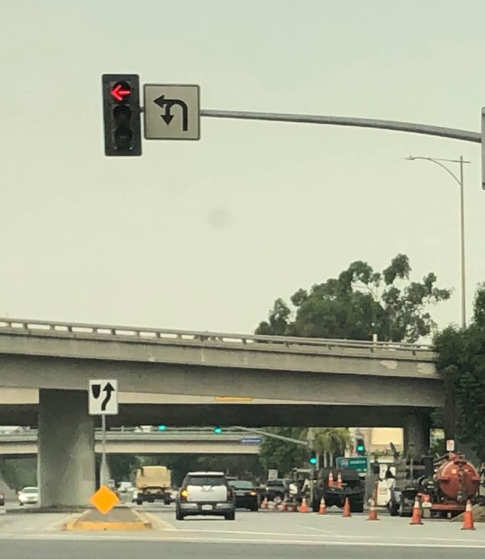 Long Beach near VA hospital traffic signal with U-Turn sign